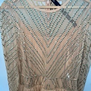 Bedazzled ruffled 1920s inspired dress. Such elegant design and brand new!